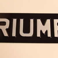 Oblong Metal Sign Black/Silver - Triumph