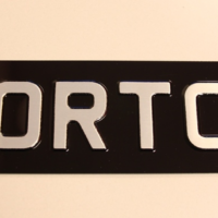 Oblong Metal Sign Black/Silver - Norton