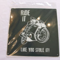 Ride it like you stole it tin sign