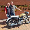 New owner collects bike