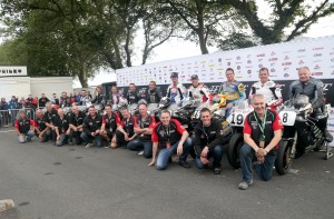 PACEMAKER, BELFAST, 29/8/2015: Brian Crighton and staff from the National Motorcycle Museum with the riders and rotary Nortons that took part in the Norton Rotary parade lap during the Classic TT. PICTURE BY STEPHEN DAVISON